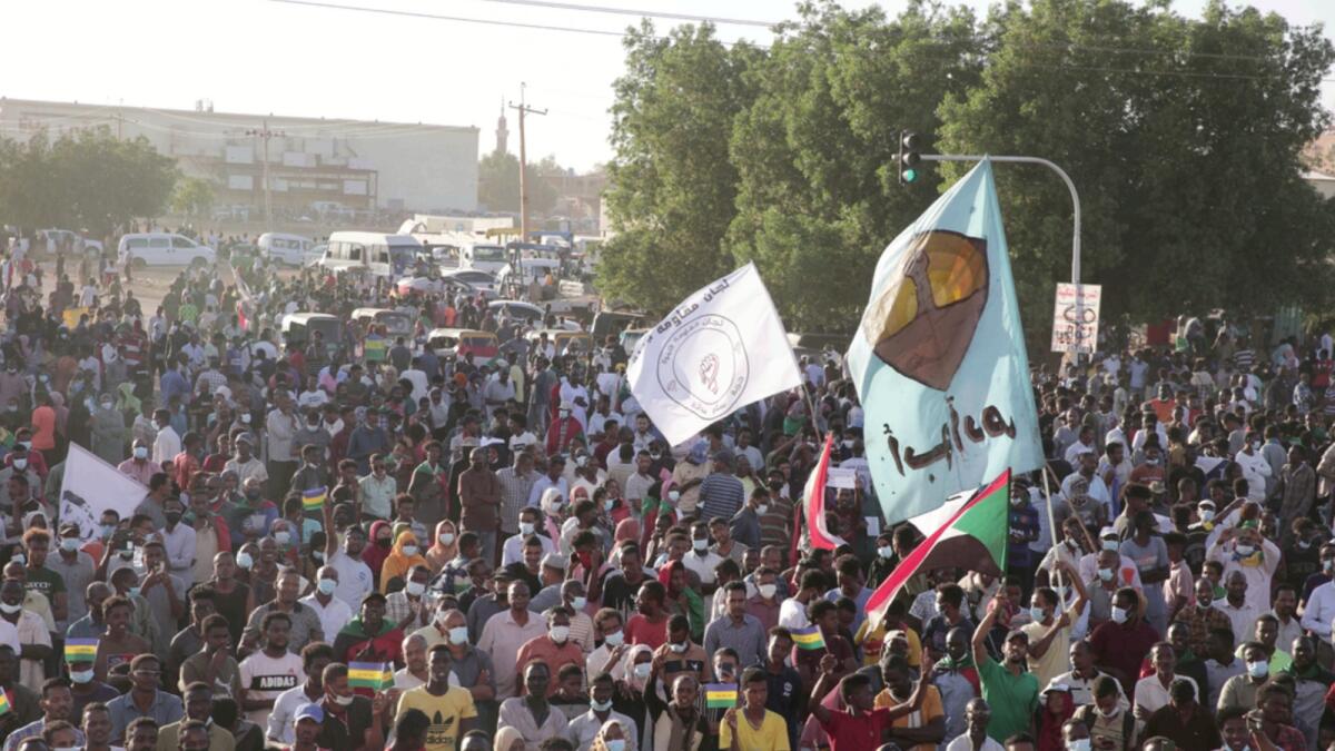 Thousands of protesters take to the streets to renew their demand for a civilian government in the Sudanese capital Khartoum. — AP