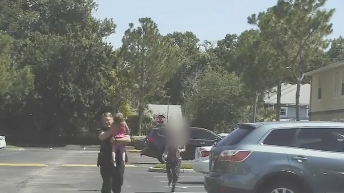 Video: Cop saves 3-year-old girl from hot car 