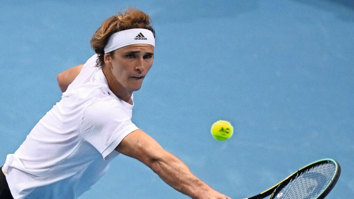 Germany's Alexander Zverev hits a backhand to Britain's Cameron Norrie on Sunday. — AP