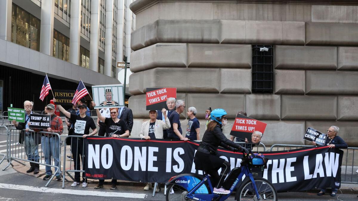 Anti-Trump protesters gather near the office of New York Attorney General Letitia James who sued former US president Donald Trump and his Trump Organisation, on the day Trump is expected to give his deposition in New York City on Thursday. — Reuters