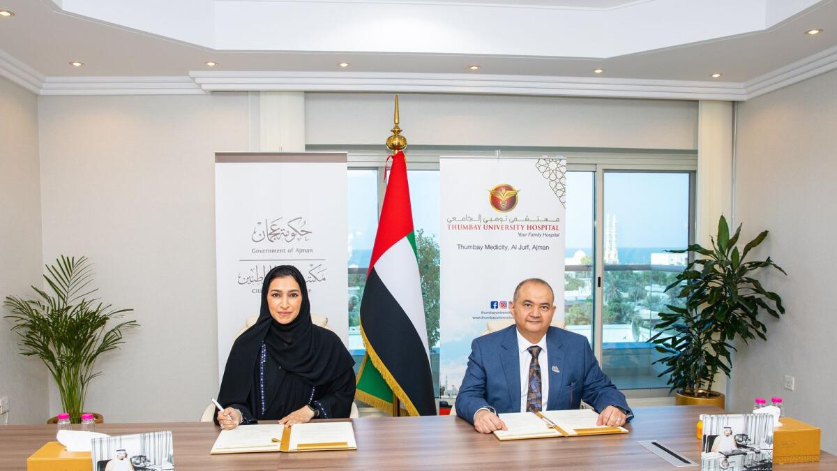 Maryam Ali Al Memary, CEO ,Citizen Affairs Office, Government of Ajman and Dr. Essam Soliman M. Atta ,Associate Director, Business Development &amp; Medical Affairs Healthcare Division, Thumbay Group at the signing ceremony of the health campaign. Supplied photo