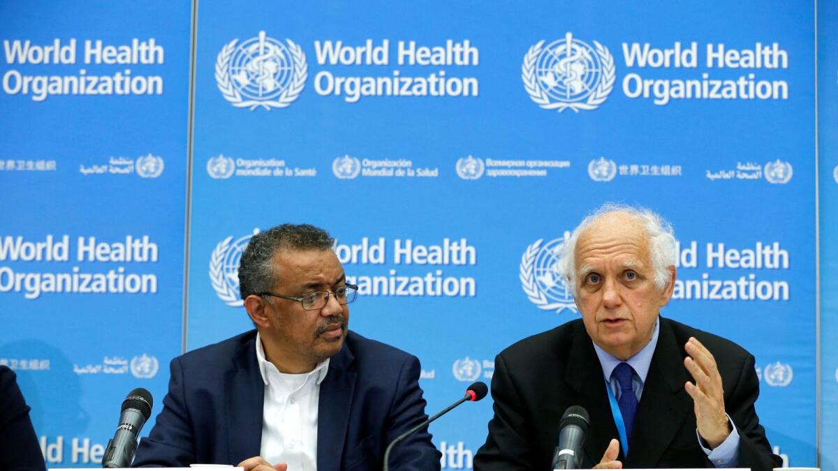 WHO director-general Tedros Adhanom Ghebreyesus listens to Didier Houssin, Chair of the Emergency Committee, as he speaks during a press conference. Photo: AFP