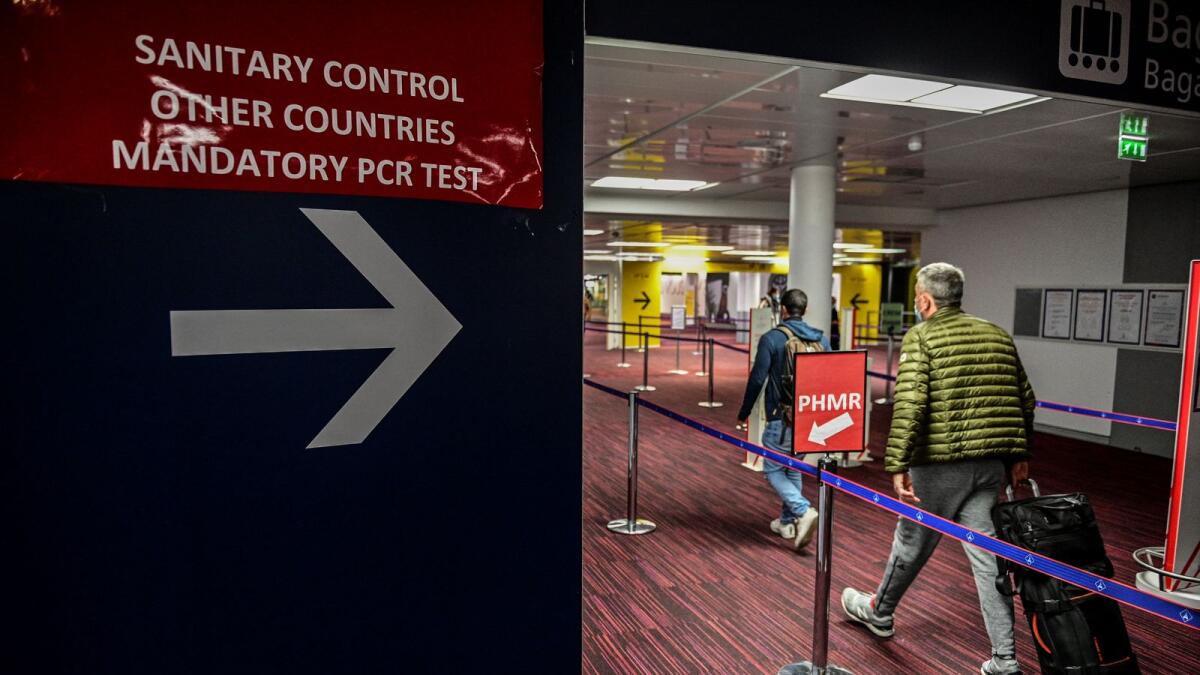 Passengers arrive at Charles De Gaulle airport in France. Photo: AFP