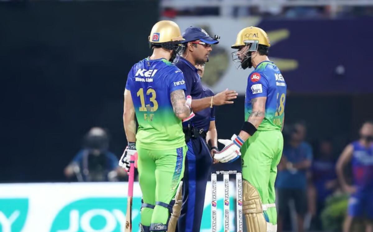 Virat Kohli (right) argues with the umpire after his dismissal on Sunday. — BCCI