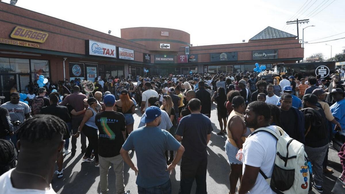 Many injured in stampede chaos at vigil for slain US rapper 