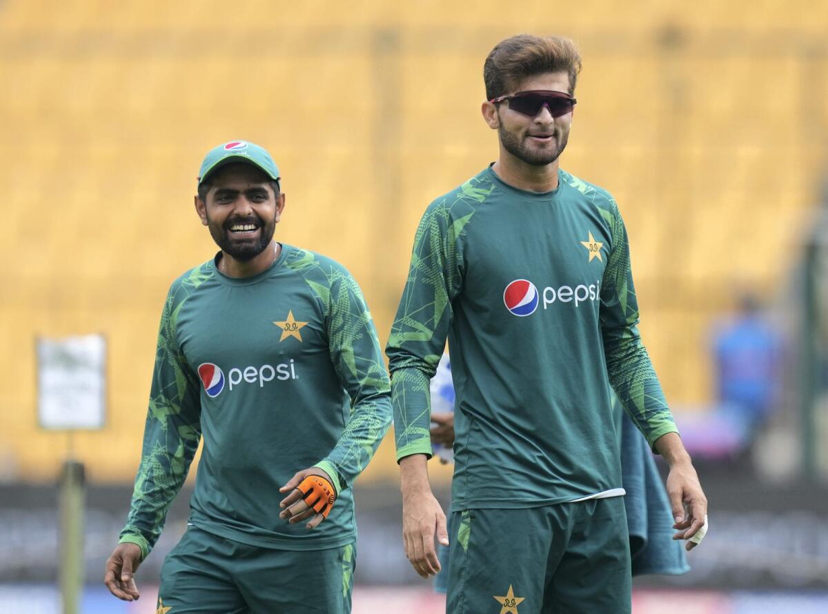 Pakistan's Babar Azam with Shaheen Shah Afridi during the 2023 ICC ODI World Cup. — PTI