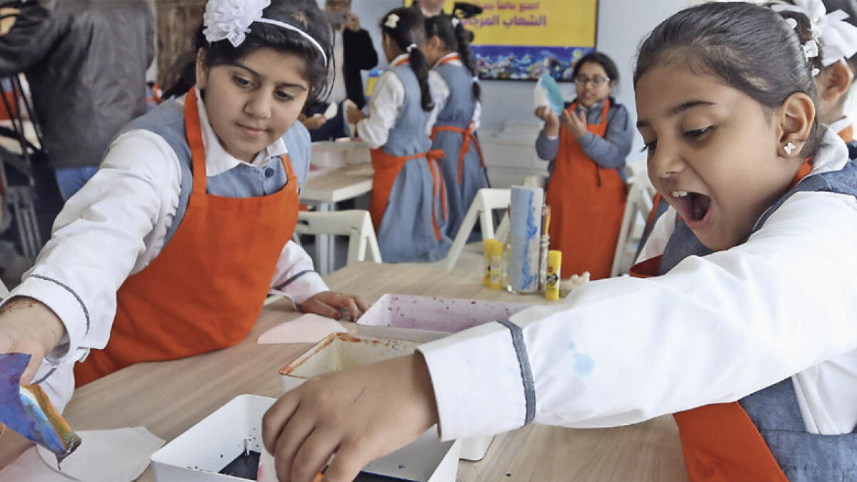 Students attend a workshop at the Art Studio of the Expo 2020 Visitor Centre in Dubai. Photo by Dhes Handumon