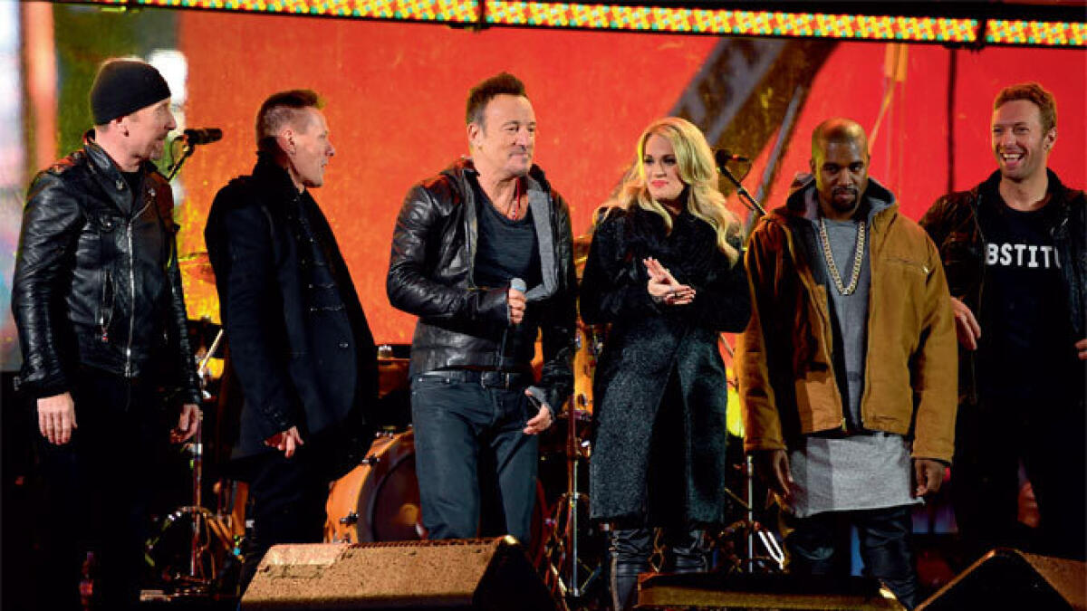 Bruce Springsteen fills in at surprise U2 AIDS show