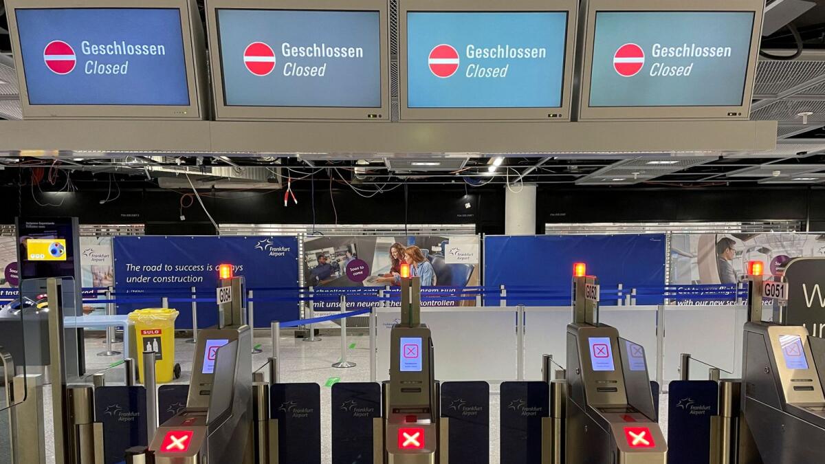 A closed security check-in at Frankfurt Airport during a strike of security staff at various German airports. — Reuters file