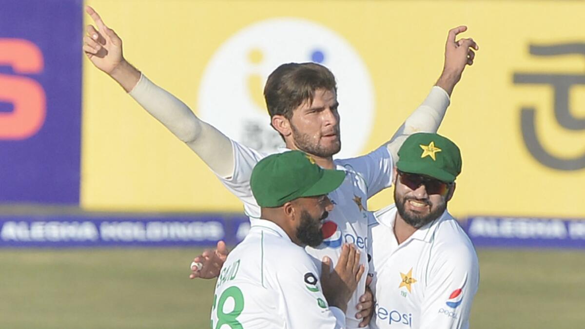 Pakistan's Shaheen Shah Afridi (centre) celebrates with teammates after dismissing Bangladesh's Najmul Hossain Shanto. (AFP)