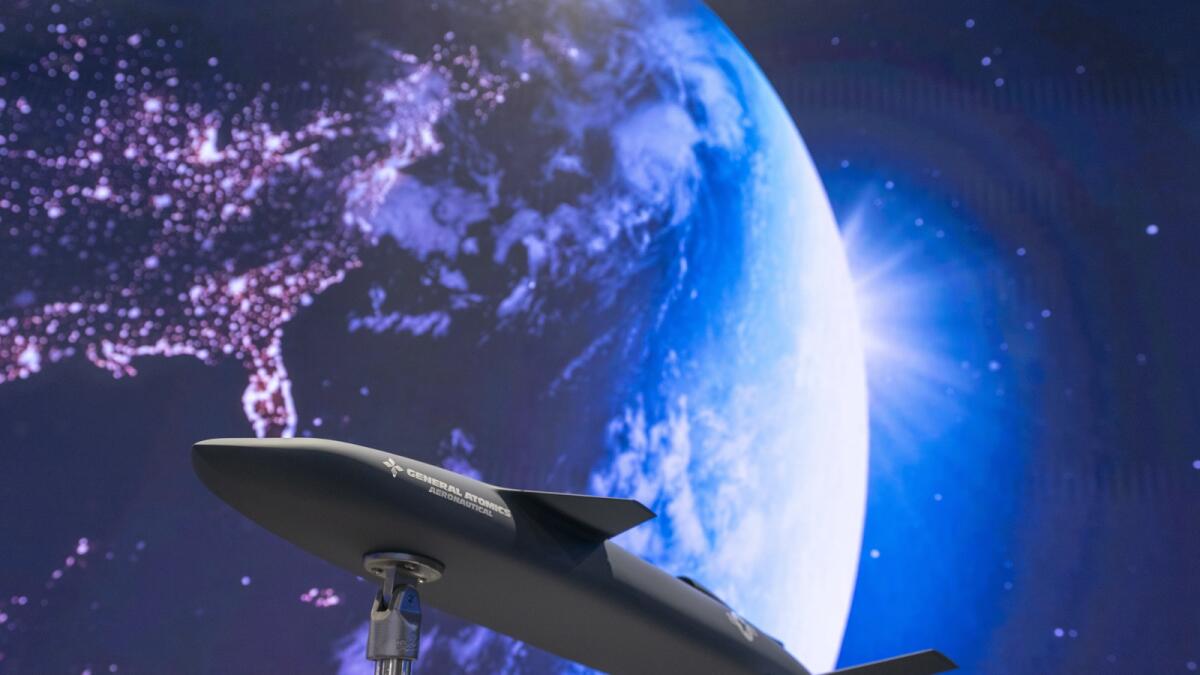 The Longshot, an air-launched unmanned aircraft that General Atomics is developing with the Defense Advanced Research Project Agency for use in tandem with piloted Air Force jets, is displayed at the Air &amp; Space Forces Association Air, Space &amp; Cyber Conference. — AP file