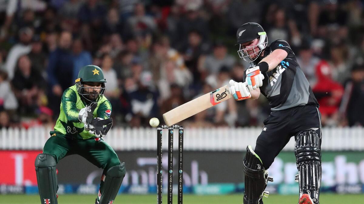 New Zealand?s Tim Seifert plays a shot as Pakistan's wicketkeeper Mohammad Rizwan looks on. — AFP