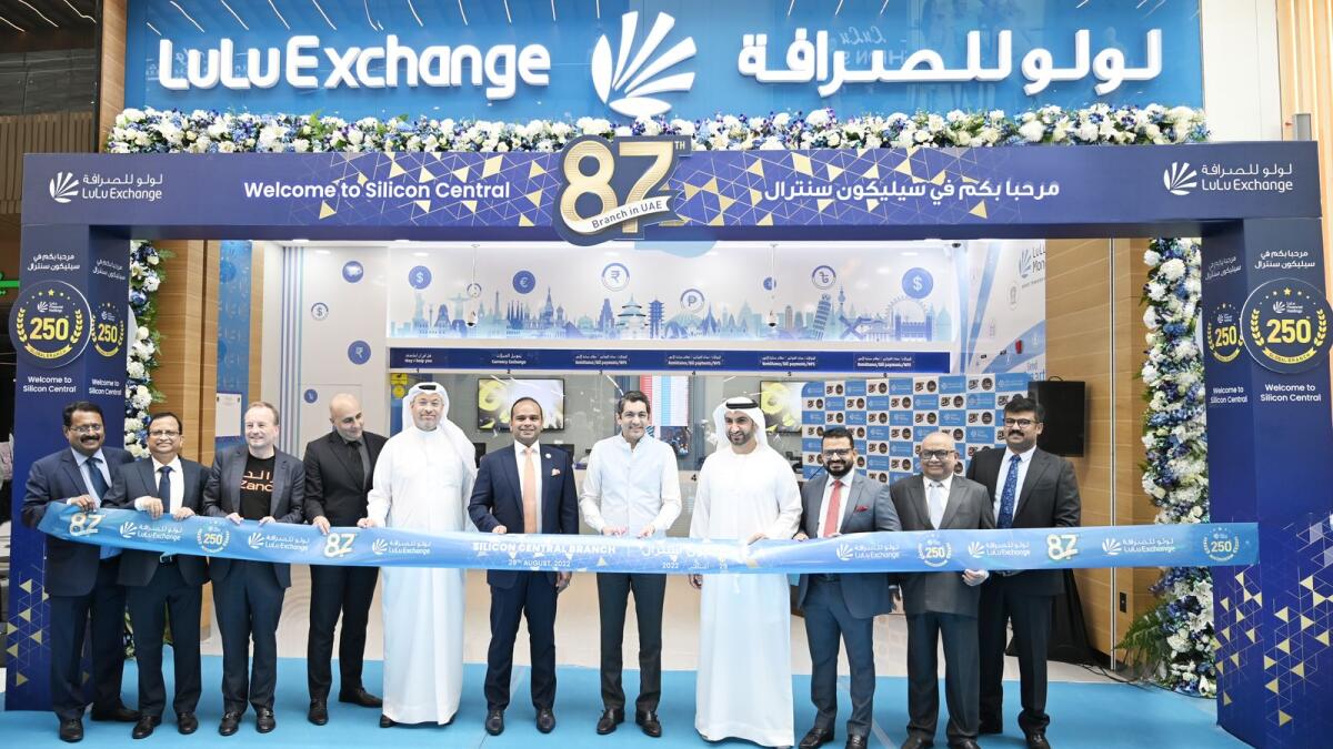 Dr Aman Puri, Consul-General of India; Adeeb Ahamed; and other senior management officials at the opening of 87th branch in the UAE and 250th globally at Silicon Central Mall, Dubai.
