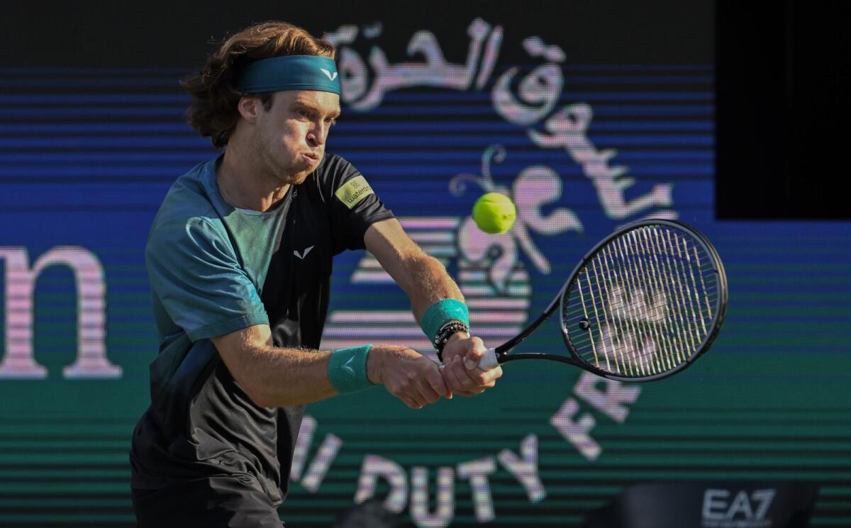 Andrey Rublev plays a backhand return during his quarterfinal match on Thursday. — Photos by Muhammad Sajjad