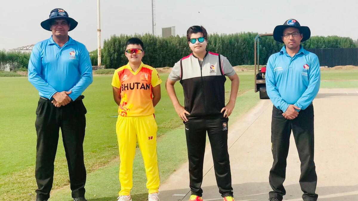 UAE captain Chaya Mughal (second from right) before the start of a warm-up match against Bhutan in Ajman.
