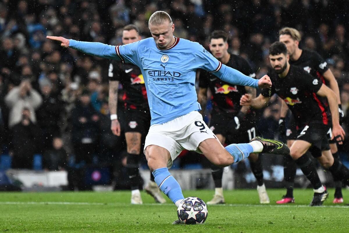 Manchester City's Norwegian striker Erling Haaland scores from the penalty spot against RB Leipzig. — AFP