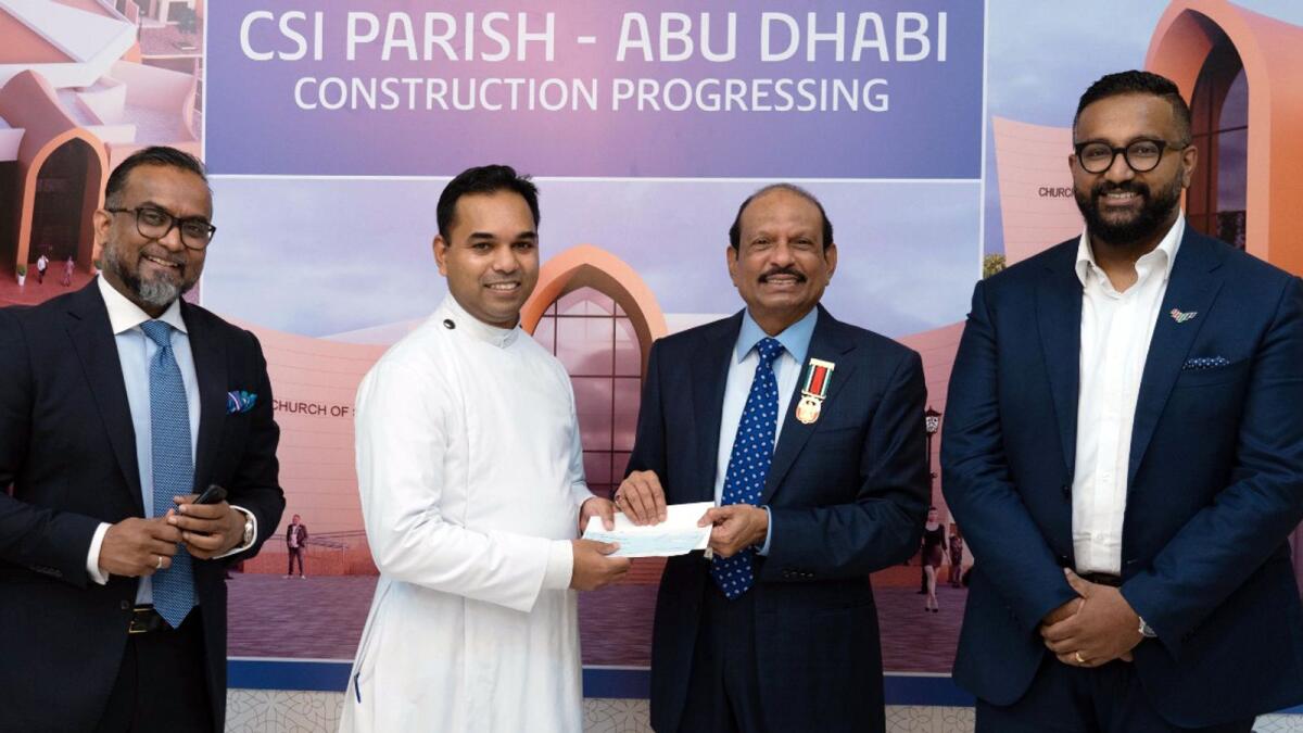 Yusuffali M.A. donates Dh500,000 to the Vicar of CSI Parish, Rev. Lalji M Philip in Abu Dhabi. — Supplied photo