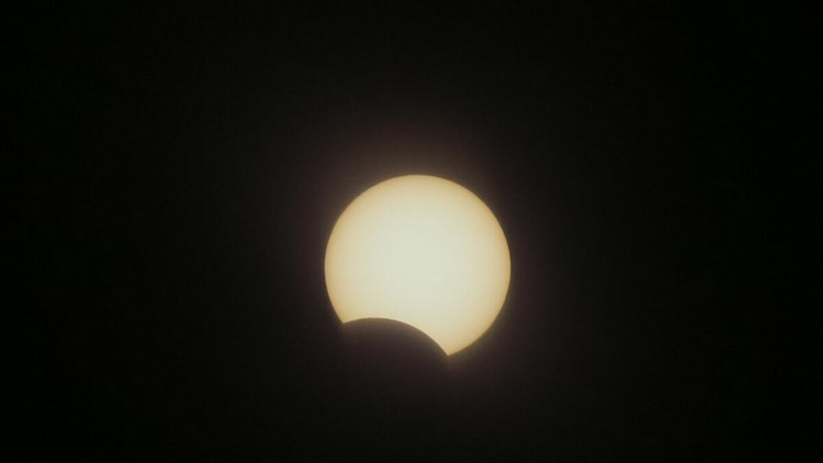 The partial solar eclipse is seen from Al Thuraya Astronomy Centre in Dubai on Thursday morning. Photo by M. Sajjad/KT