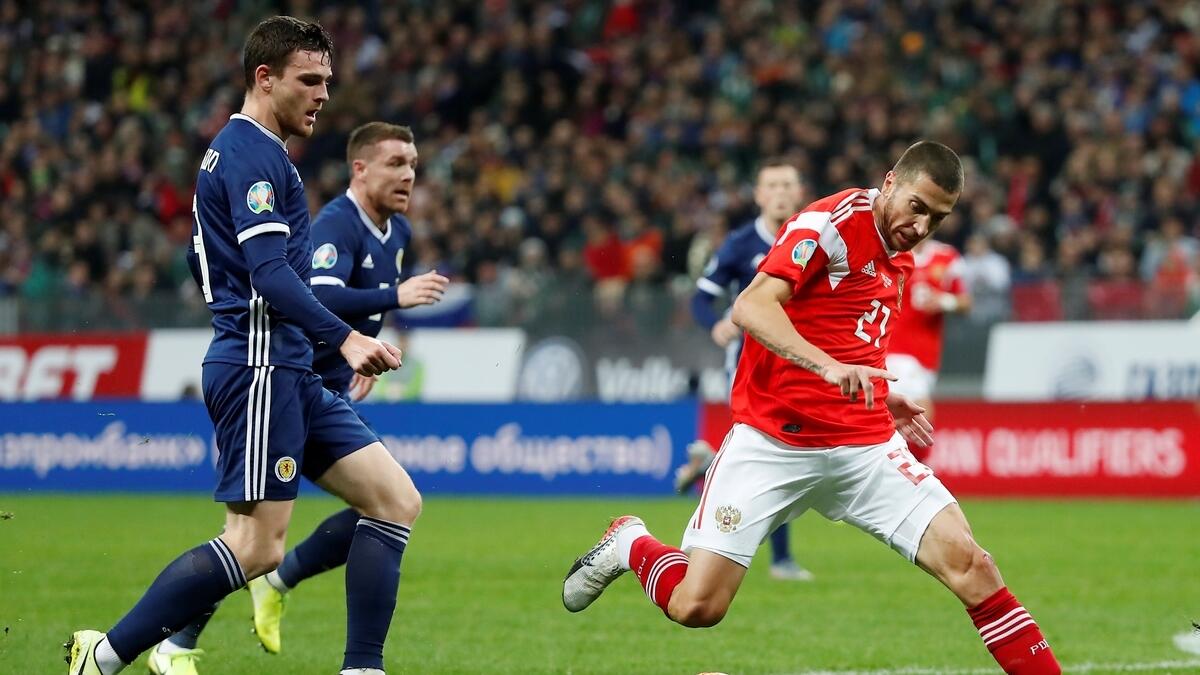 Russia on brink of Euro 2020 after Dzyuba downs hapless Scots