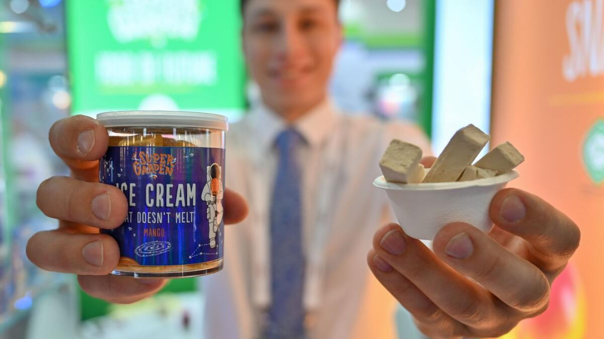 A staffer with the ice cream from Super Garden of Estonia at Gulf Food 2023 in Dubai - Photo by M. Sajjad
