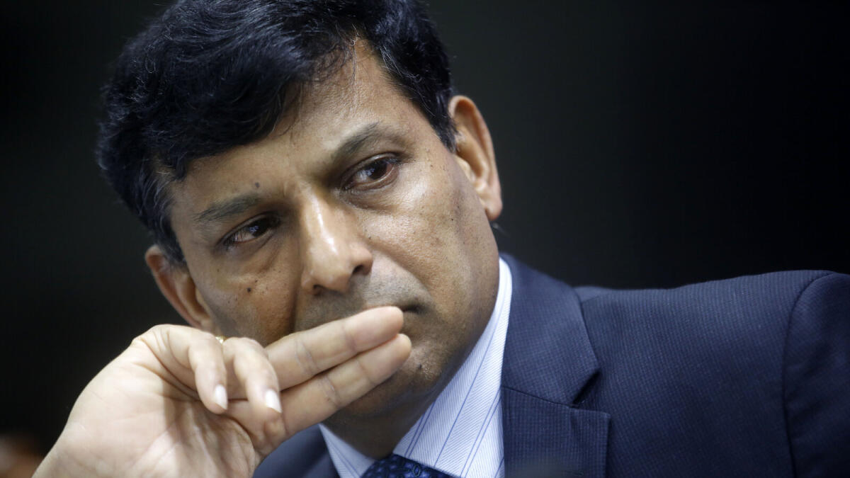 Governor of the Reserve Bank of India Raghuram Rajan attends a press conference in Mumbai, India, Tuesday, Dec. 1, 2015. Rajan on Tuesday kept key rates unchanged citing multiple factors, according to news reports. (AP Photo/Rajanish Kakade)
