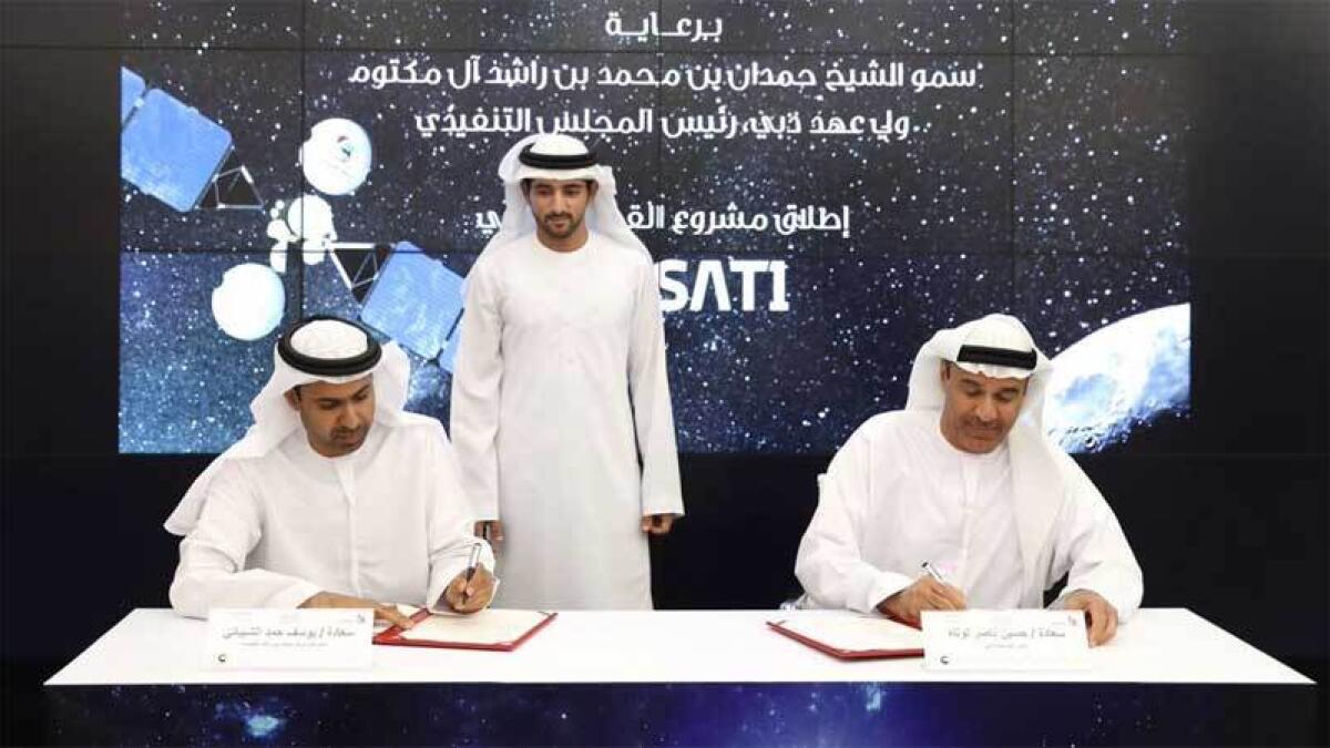 Shaikh Hamdan signs deal for UAEs first environmental satellite