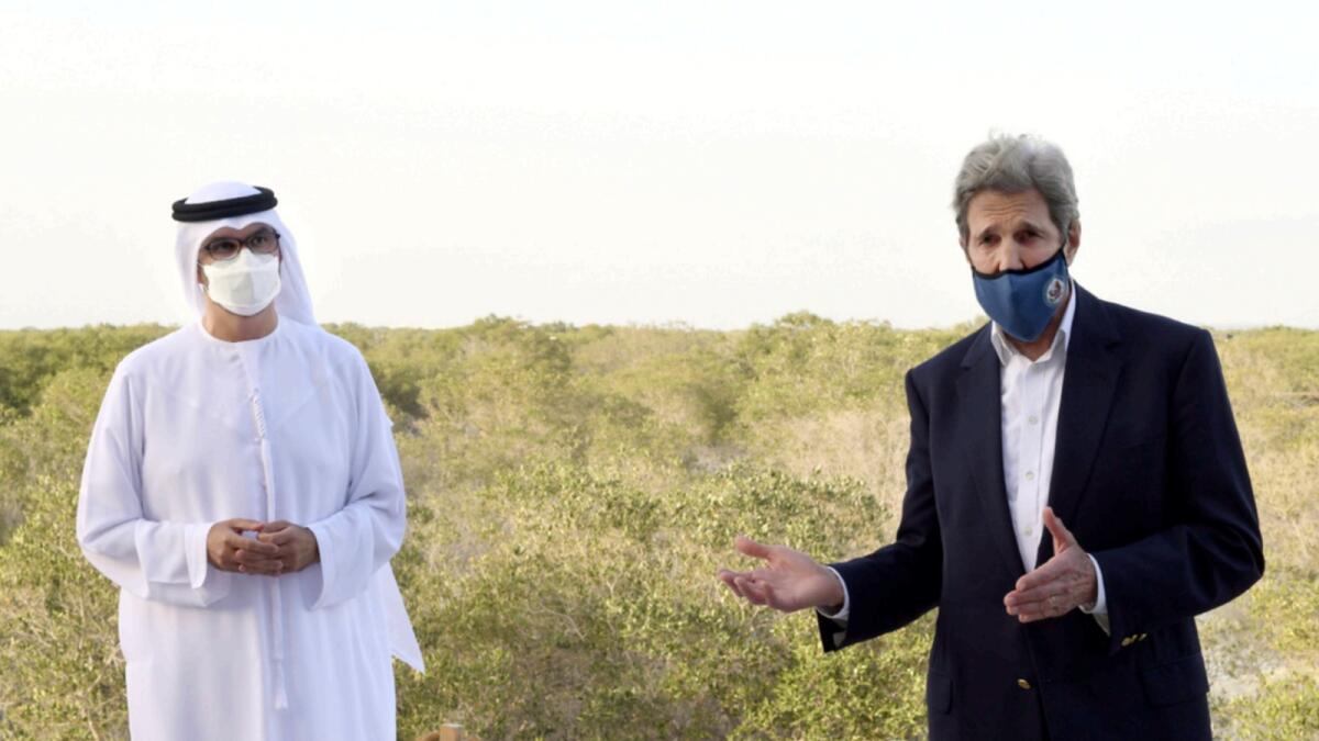 Sultan Al Jaber and John Kerry during a visit to Jubail Mangrove Park in Abu Dhabi. — Wam