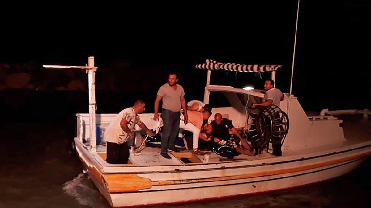 Rescuers search for victims and survivors off the coast of Syria's southern port city of Tartus after a boat carrying migrants from Lebanon capsized in the Mediterranean sea. –AFP