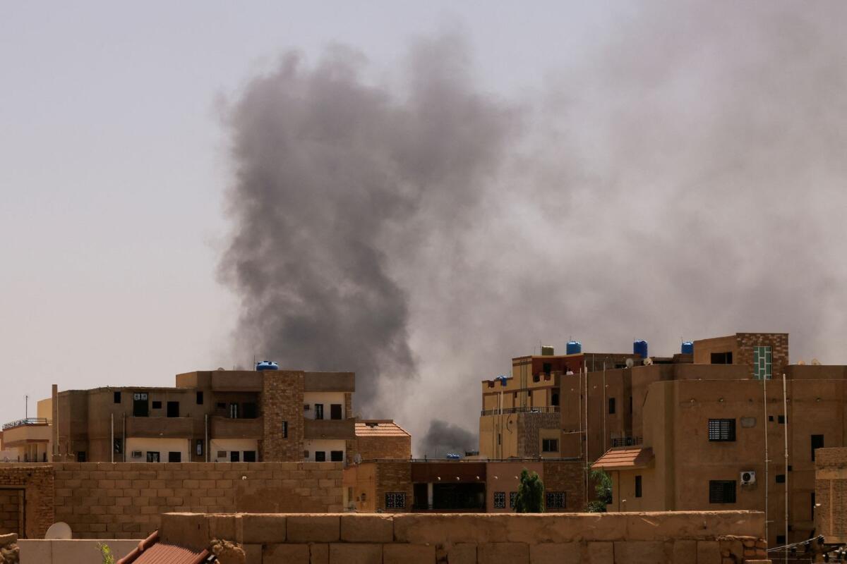 Smoke is seen rise from buildings during clashes between the paramilitary Rapid Support Forces and the army in Khartoum North, Sudan. Photo: Reuters