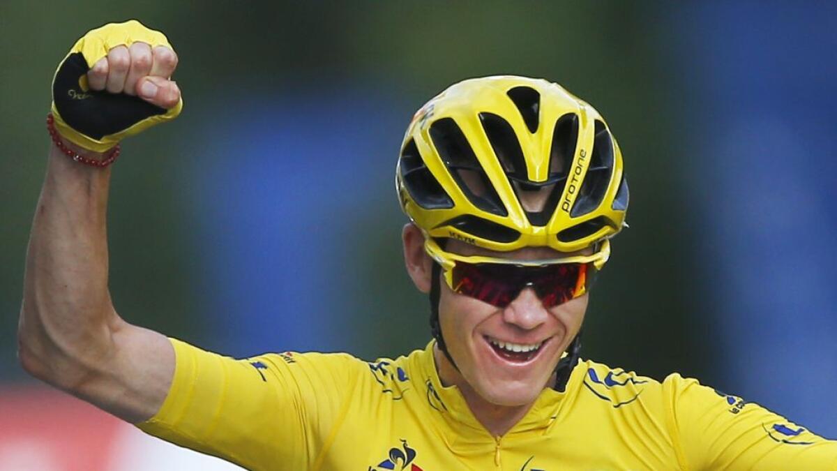 Cycling: Froome claims third Tour de France title