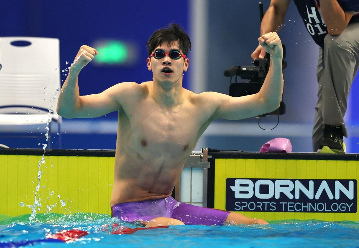 China's Pan Zhanle reacts after winning the men's 100m freestyle final. — Reuters