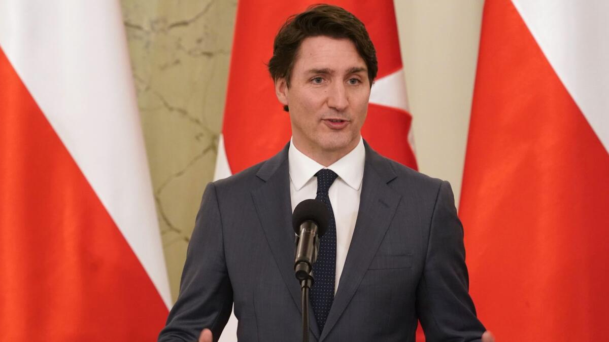 Canadian Prime Minister Justin Trudeau addresses a press briefing with the Polish President at presidential palace in Warsaw, Poland on March 10, 2022. Photo: AFP