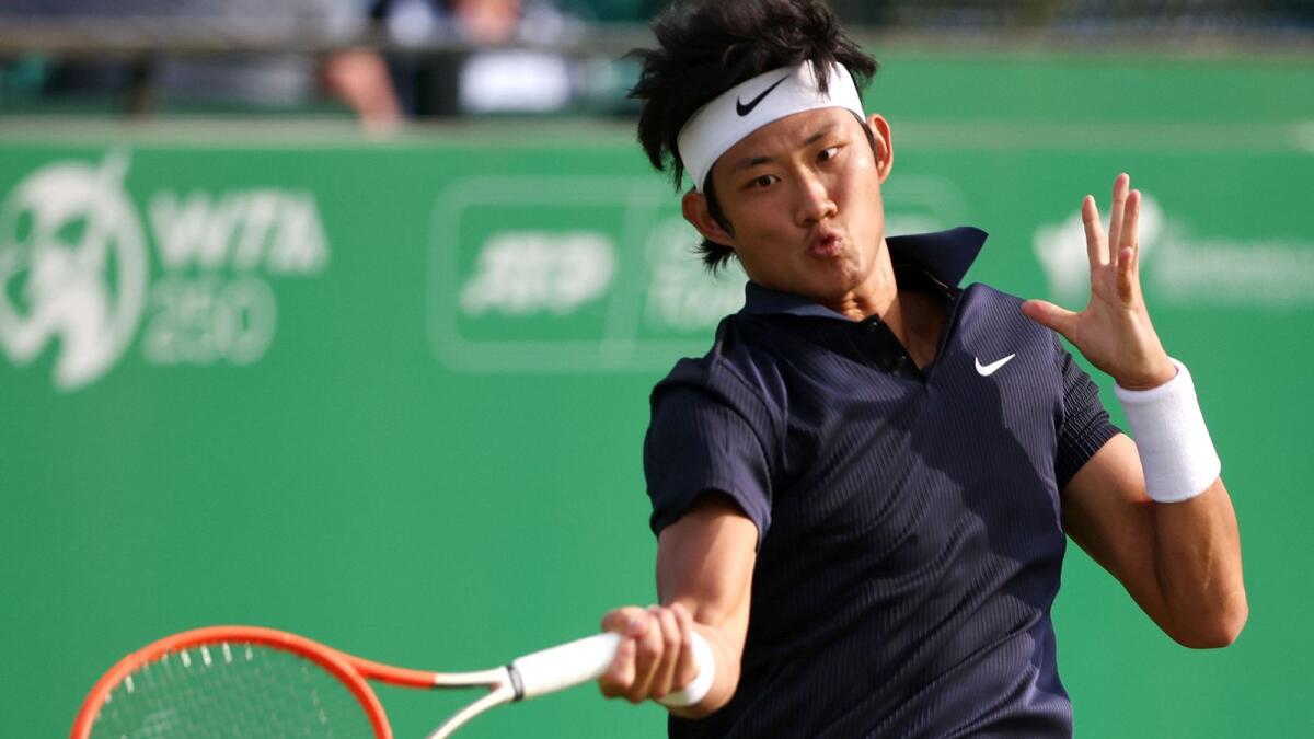 China's Zhizhen Zhang books his Wimbledon spot by defeating Argentine Francisco Cerundolo in four sets on Thursday . — Reuters