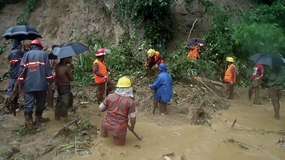Rain-triggered landslides kill 68 in Bangladesh