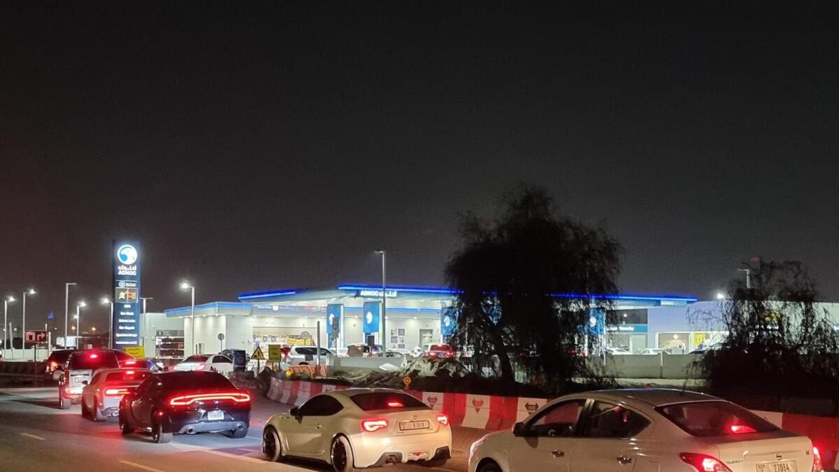 Long queue in front of the fuel station in Al Barsha, Dubai on Monday night. Photo by Shihab