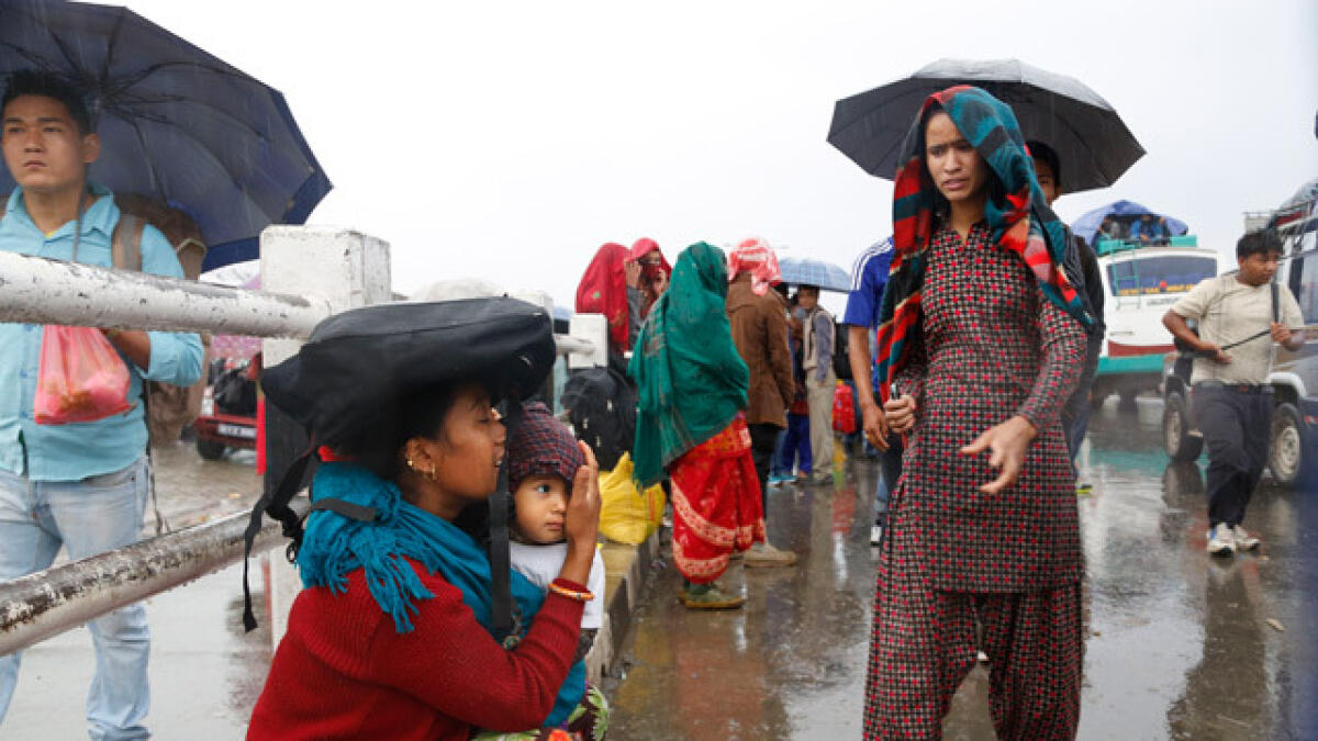 Rain hampers search for dozens missing in Nepal landslide