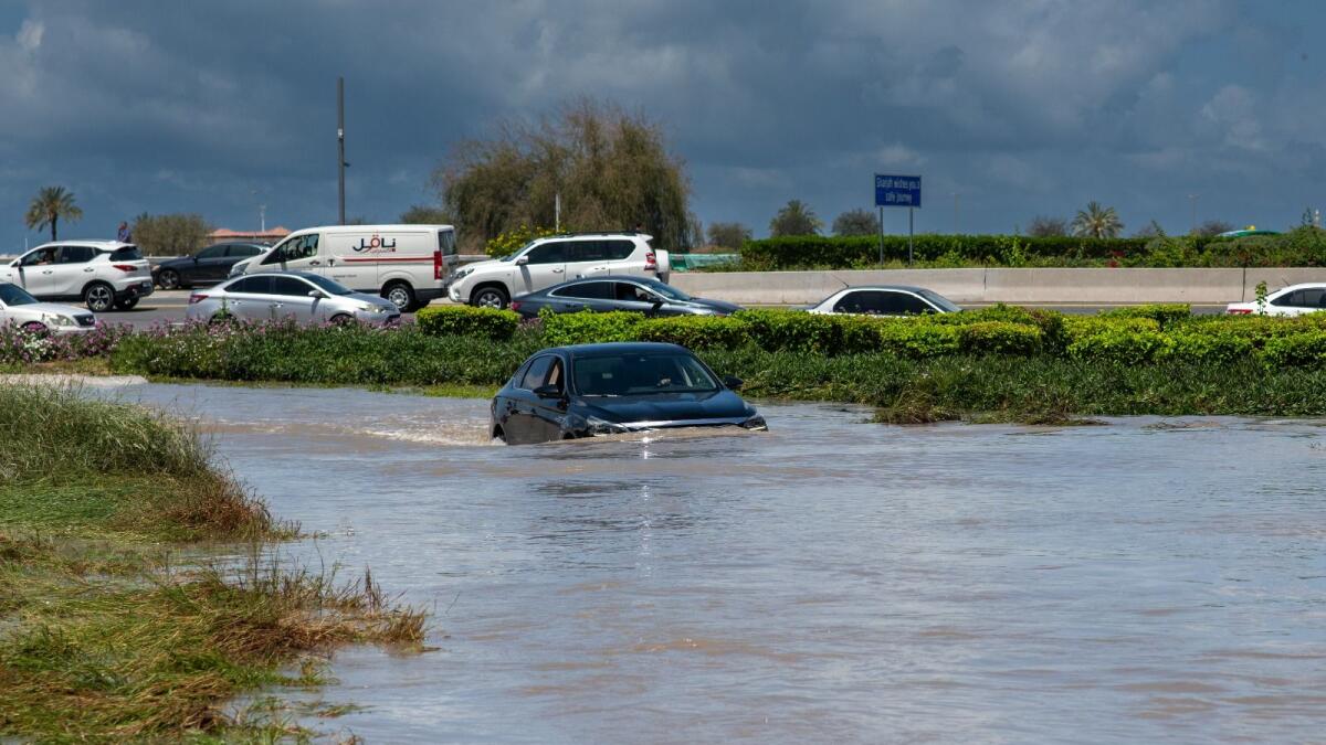 A road remains flooded in Al Nahda, Sharjah, on Wednesday. — KT Photo: Shihab