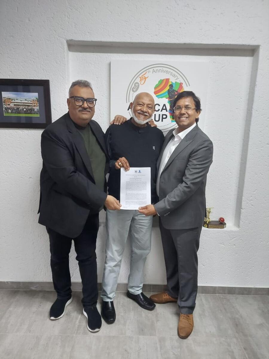 Cassim Suliman (CEO Africa Cricket Association) along with Corcom Media’s co-founders Vivek Tiwari (left) and Nirala Singh (right) after signing a 10-year partnership to develop cricket in Africa. — Supplied photo