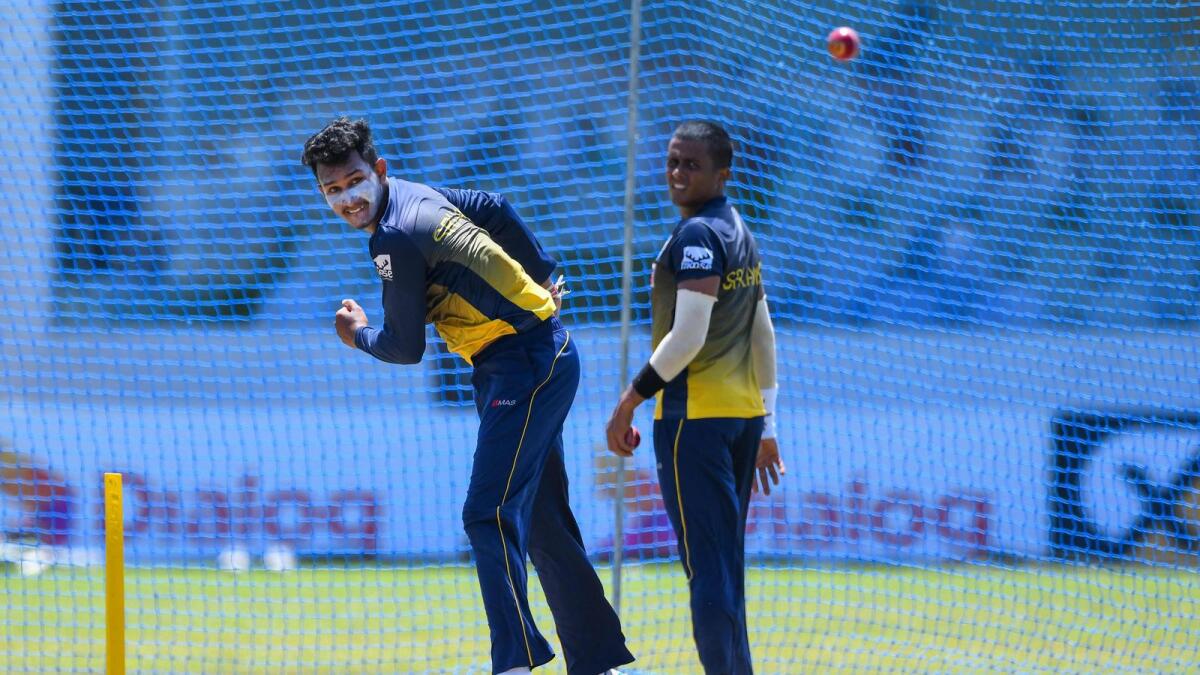 Sri Lankan spinner Praveen Jayawickrama (left) during a training session. (AFP)