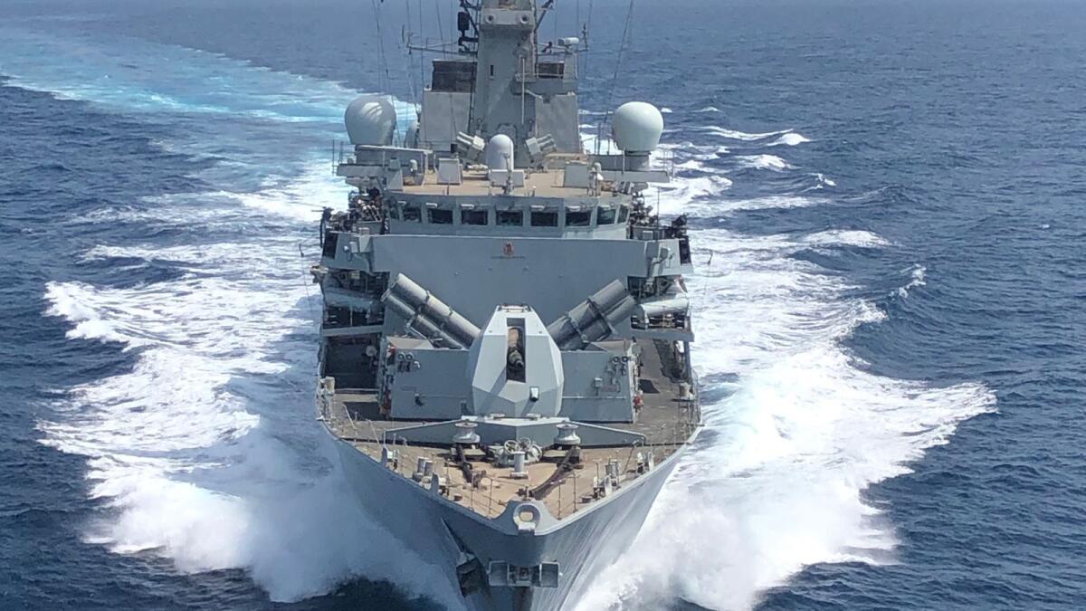 Image used for illustrative purpose. HMS Montrose accompanying merchant vessels in the Gulf. (Photo: AFP)