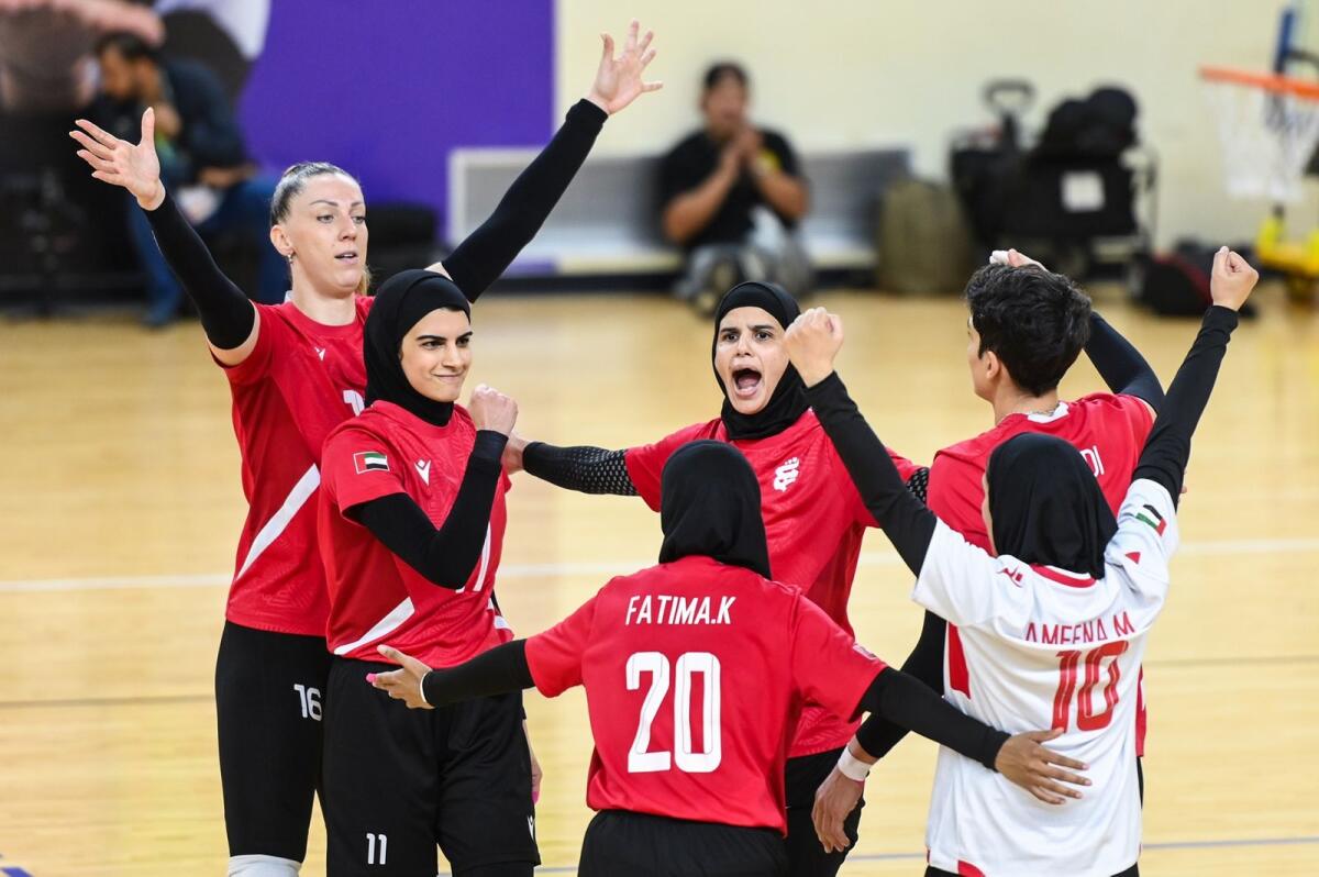 Sharjah Women's Sports Club players celebrate after winning a volleyball match. They won the bronze medal. — Supplied photo