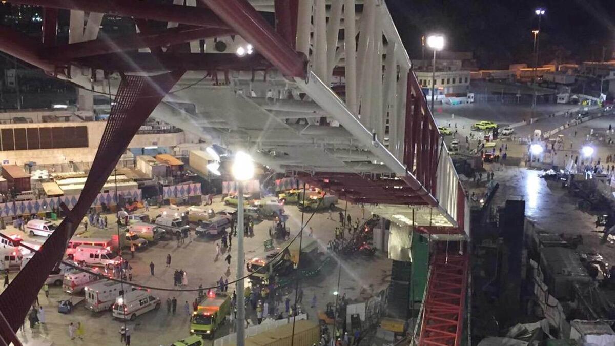 In this image released by the Saudi Interior Ministry’s General Directorate of Civil Defense, a collapsed crane and emergency services vehicles are seen near the Grand Mosque.- AP