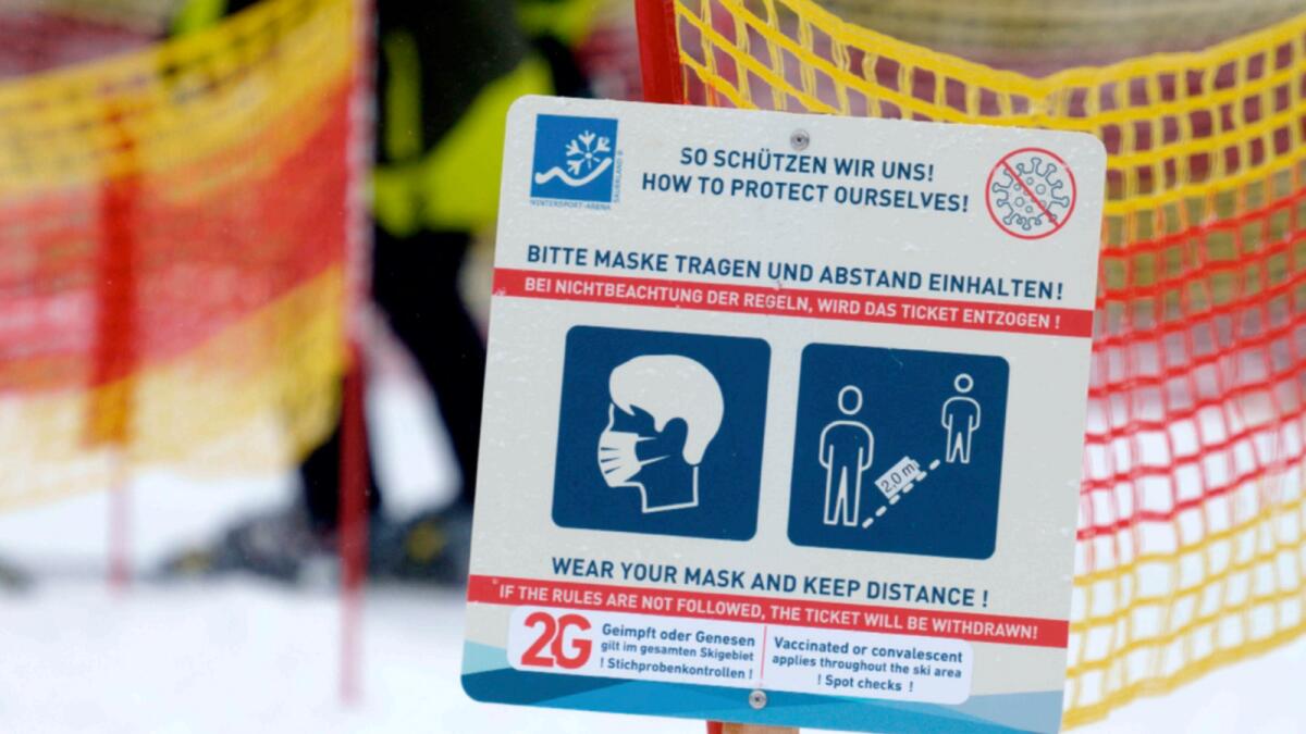 A sign indicating Covid-19 restrictions is seen at the Rauher Busch ski slope in Winterberg, — AP file