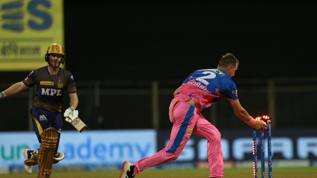 Chris Morris of Rajasthan Royals runs out Eoin Morgan in Mumbai on Saturday night. — BCCI/IPL