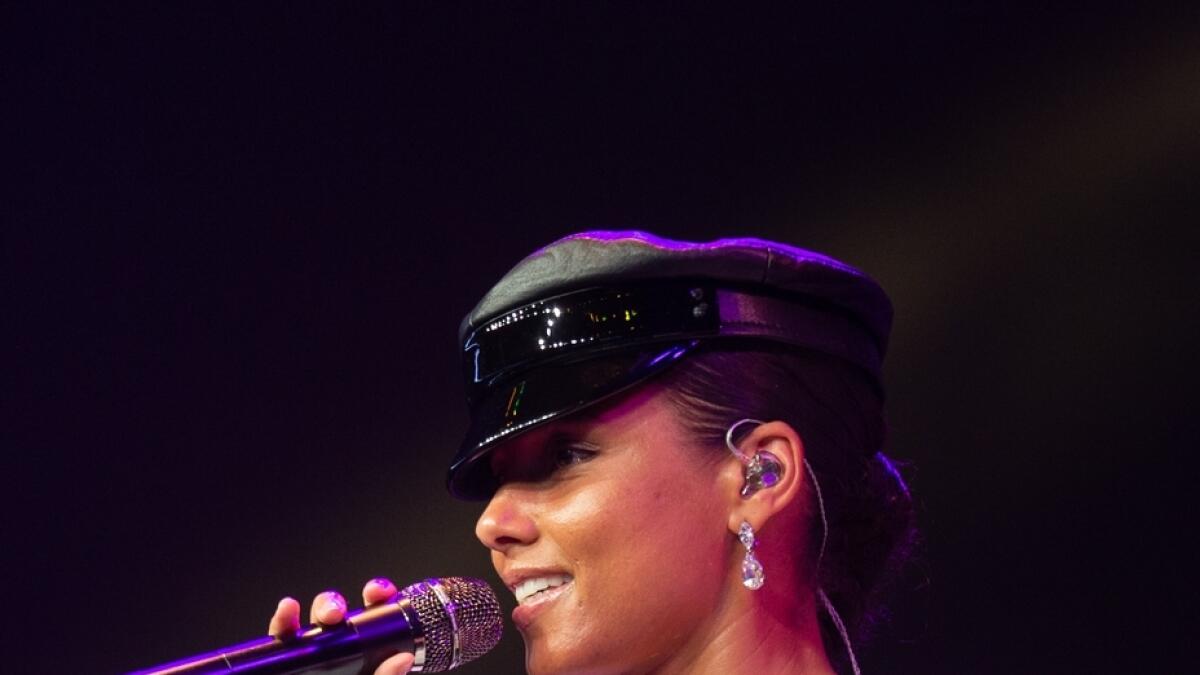 Alicia Keys on stage in Dubai at the coca cola arena as part of tony robbins Achieve The Unimaginable