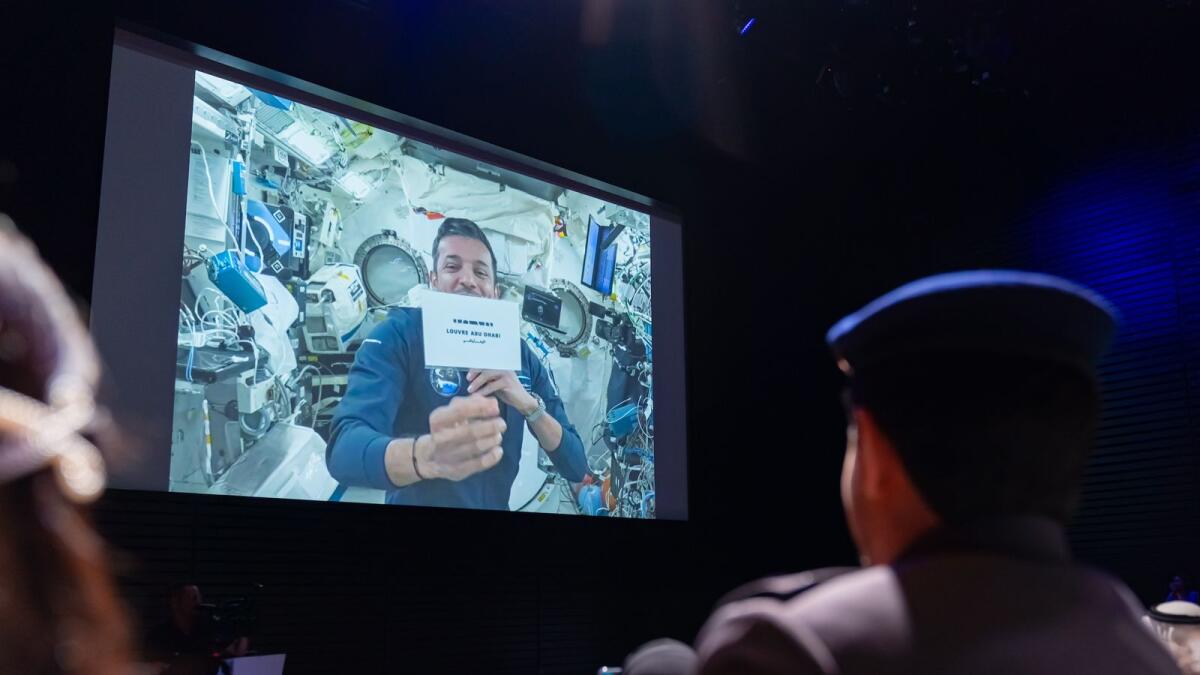 Sultan AlNeyadi talks to the attendees of the event from the ISS.