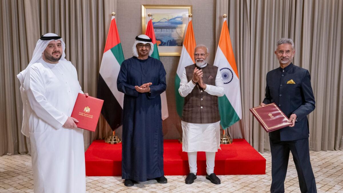 President Sheikh Mohamed bin Zayed Al Nahyan and Indian Prime Minister Narendra Modi witnessing the signing of the pact between Mohamed Hassan Alsuwaidi, Minister of Investment of the UAE; and D. Subrahmanyam Jaishankar, External Affairs Minister of India. — Supplied photo