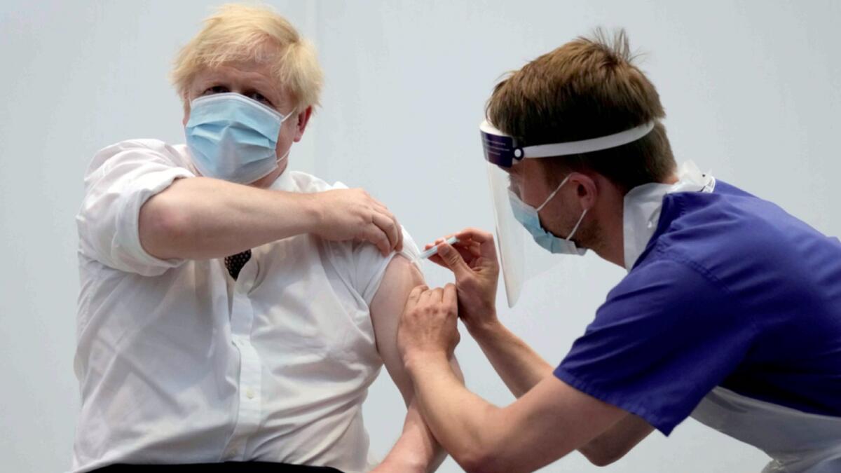 Britain's Prime Minister Boris Johnson receives his second dose of Covid-19 vaccine in June. — Reuters file