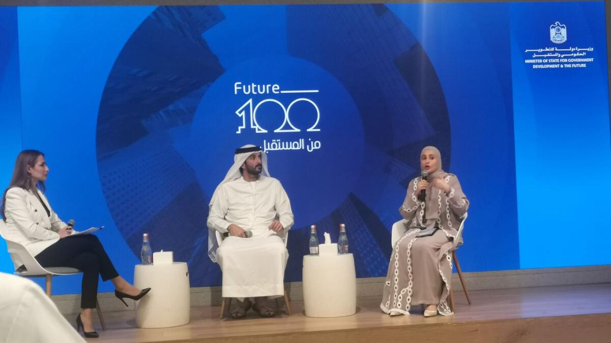 Abdulla bin Touq Al Marri and Ohood bint Khalfan Al Roumi address the press conference to launch “Future 100” initiative in Dubai on Tuesday. — Photo by Waheed Abbas 