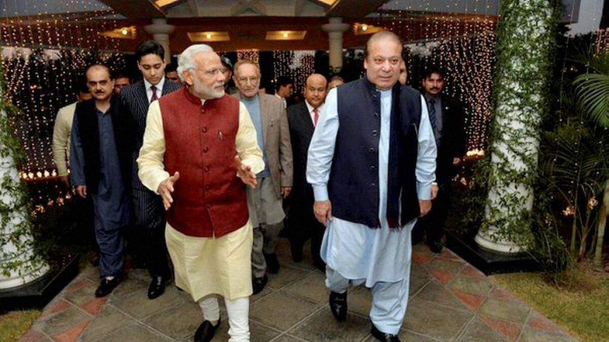 Modi touches Pakistani PM mothers feet as mark of respect